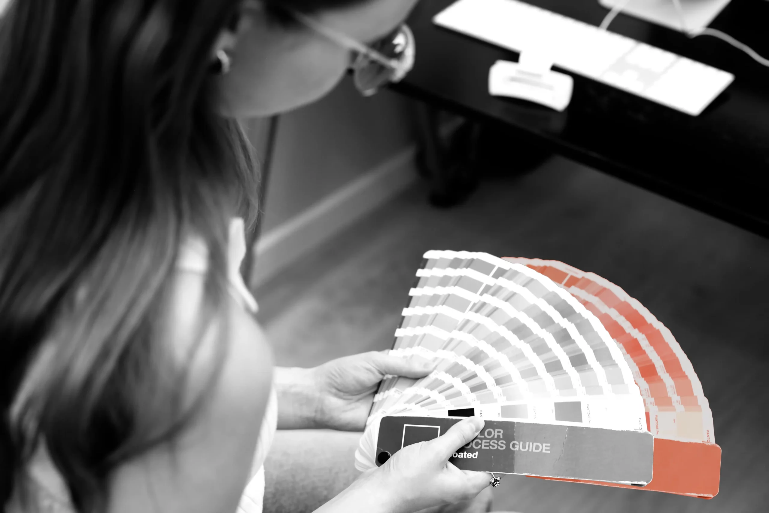 Team member looking at Pantone Colors
